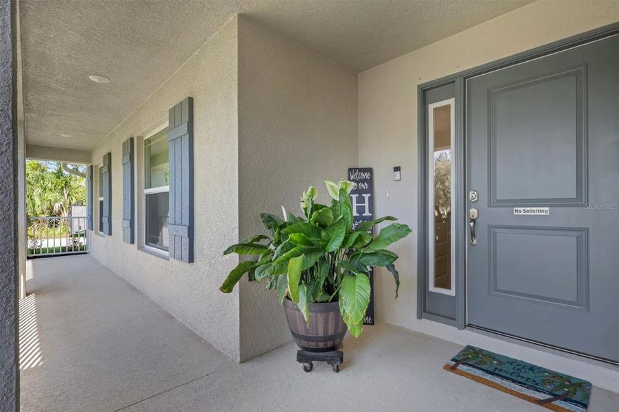 Exterior details and patio area of a home in , North Port (Image 28).