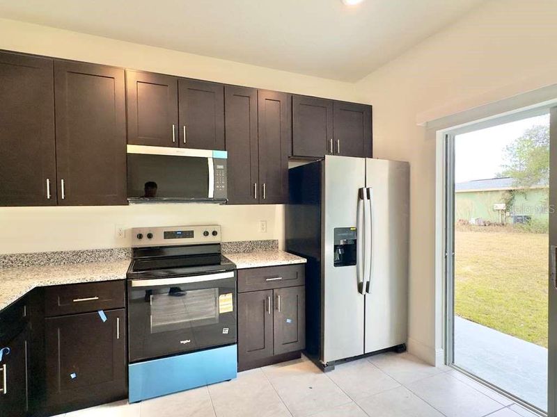 Furnished interior view inside a new home in , Ocala (Image 18).
