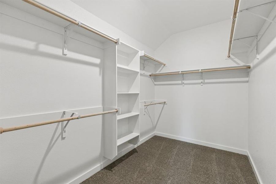 Primary Closet in the Oscar home plan by Trophy Signature Homes – REPRESENTATIVE PHOTO Primary Closet in the Oscar home plan by Trophy Signature Homes – REPRESENTATIVE PHOTO