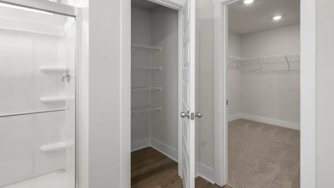 Spacious, unfurnished interior of a new home in The Highlands at Cedar Hill Landing, Navassa (Image 25).
