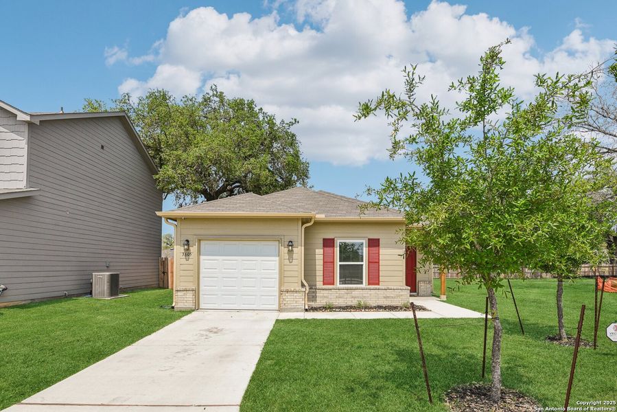 Front exterior of a new home in Lonesome Dove, San Antonio, TX, highlighting curb appeal (Image 26). Front exterior of a new home in Lonesome Dove, San Antonio, TX, highlighting curb appeal (Image 26).