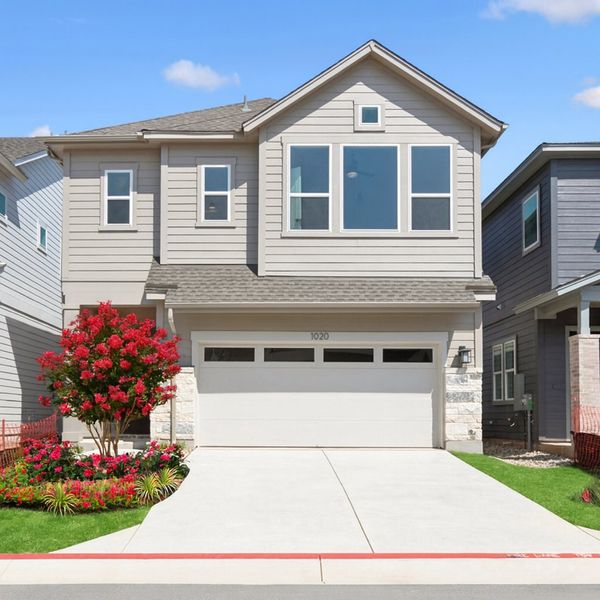 Front exterior of a new home in Easton Park – Nelson Village - Haven Series, Austin, TX, highlighting curb appeal (Image 1).