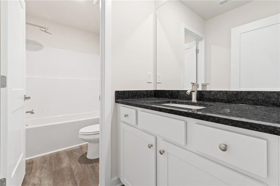 Furnished interior view inside a new home in Fern Dale, Fairburn (Image 11).