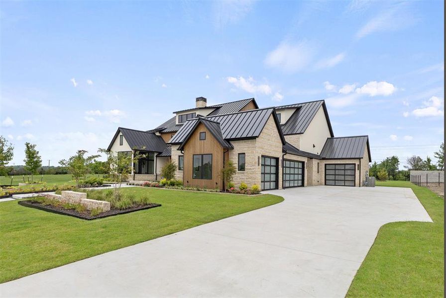 Front exterior of a new home in , Heath, TX, highlighting curb appeal (Image 1). Front exterior of a new home in , Heath, TX, highlighting curb appeal (Image 1).