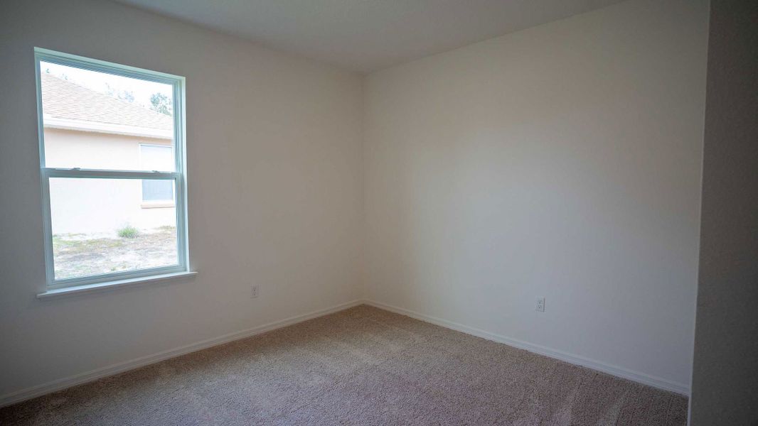 Spacious, unfurnished interior of a new home in Woodland Ranch, Lake Wales (Image 16).