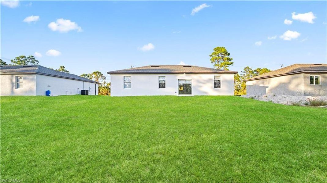 Exterior details and patio area of a home in , Lehigh Acres (Image 3).
