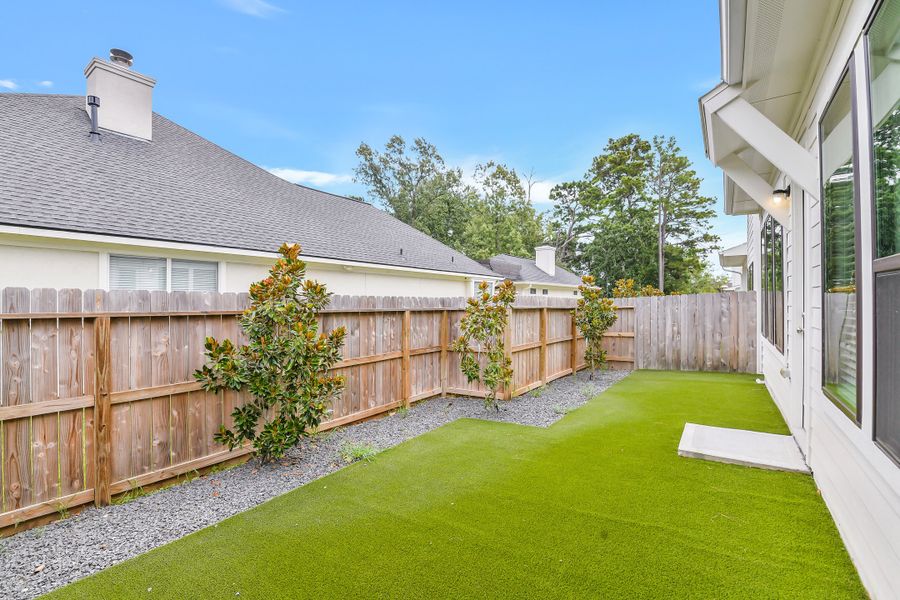 Exterior details and patio area of a home in Summer Place  35', Montgomery (Image 31).