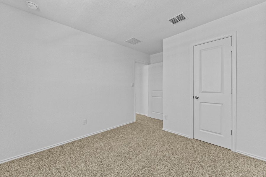 Spacious, unfurnished interior of a new home in Valverde, Bastrop (Image 32).