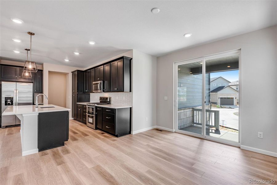 Furnished interior view inside a new home in Crescendo at The Aurora Highlands, Aurora (Image 11).
