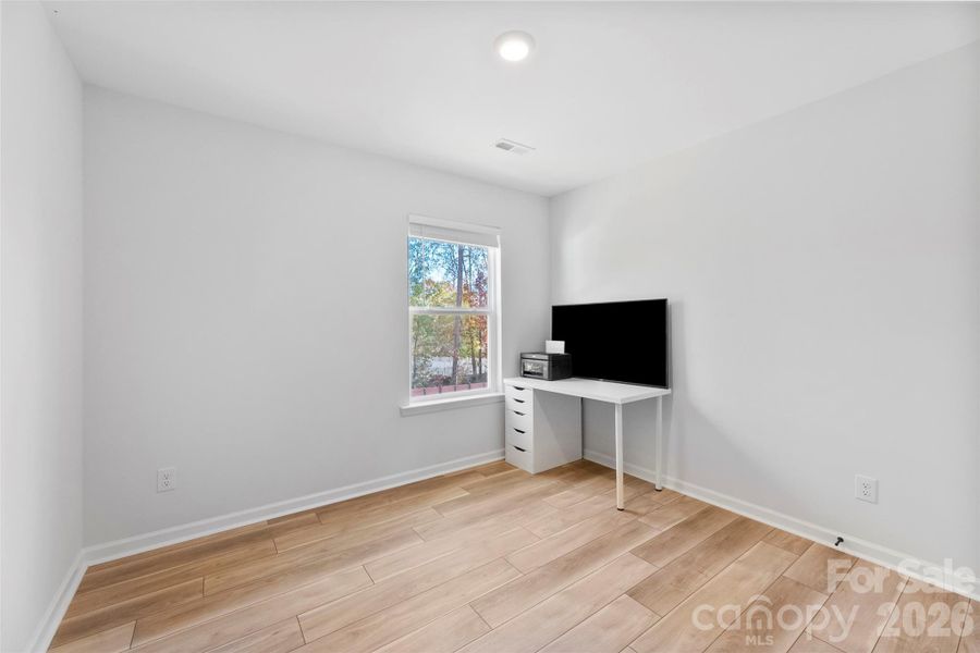 Spacious, unfurnished interior of a new home in Surrey Woods, Charlotte (Image 21).