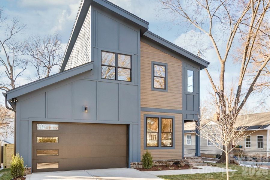 Front exterior of a new home in , Charlotte, NC, highlighting curb appeal (Image 1). Front exterior of a new home in , Charlotte, NC, highlighting curb appeal (Image 1).