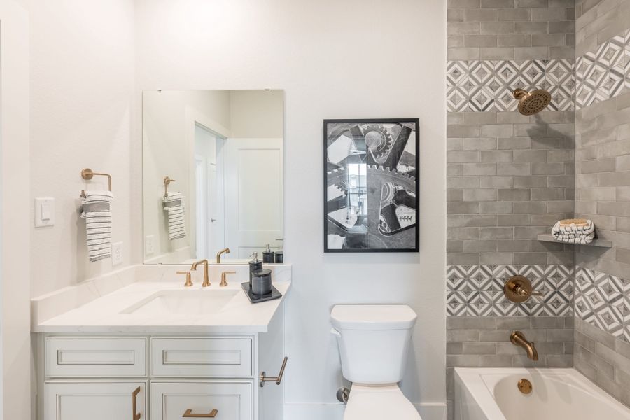 Representative furnished interior of a home built from the Woodbridge by Tri Pointe Homes in Bridgeland, Cypress (Image 46).