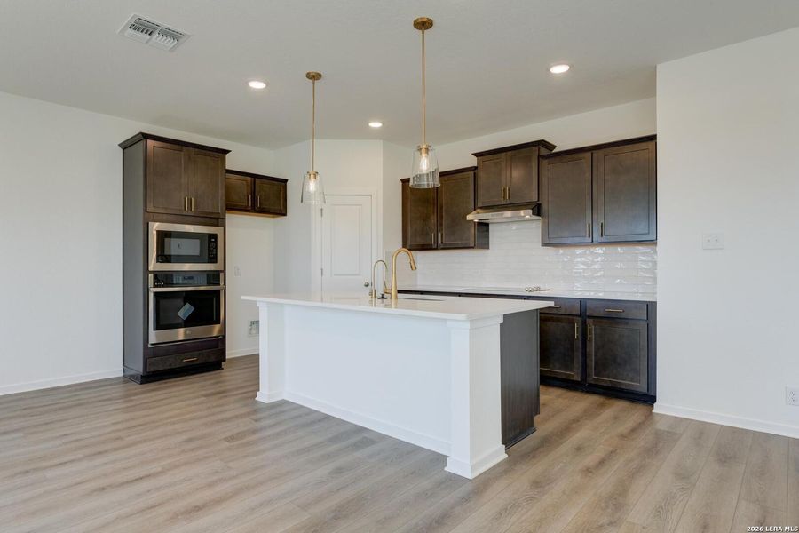 Furnished interior view inside a new home in Hennersby Hollow, San Antonio (Image 8).