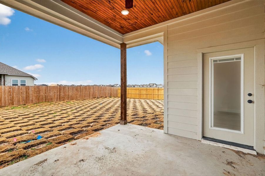Exterior details and patio area of a home in , Snook (Image 3).