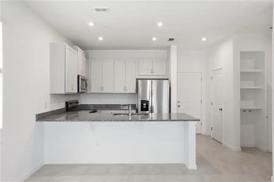 Furnished interior view inside a new home in , Orlando (Image 8).