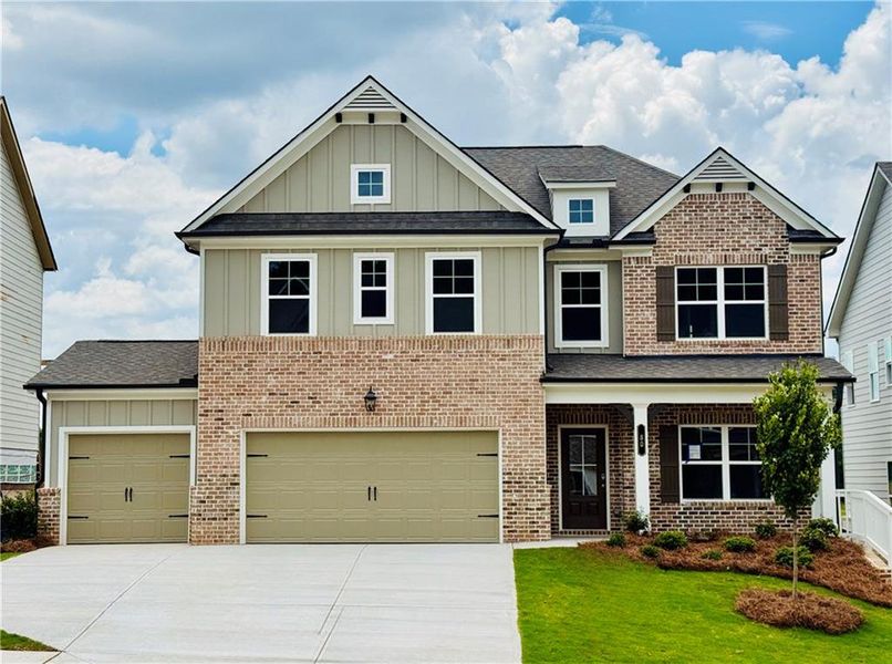 Front exterior of a new home in Fowler Farms, Auburn, GA, highlighting curb appeal (Image 1). Front exterior of a new home in Fowler Farms, Auburn, GA, highlighting curb appeal (Image 1).