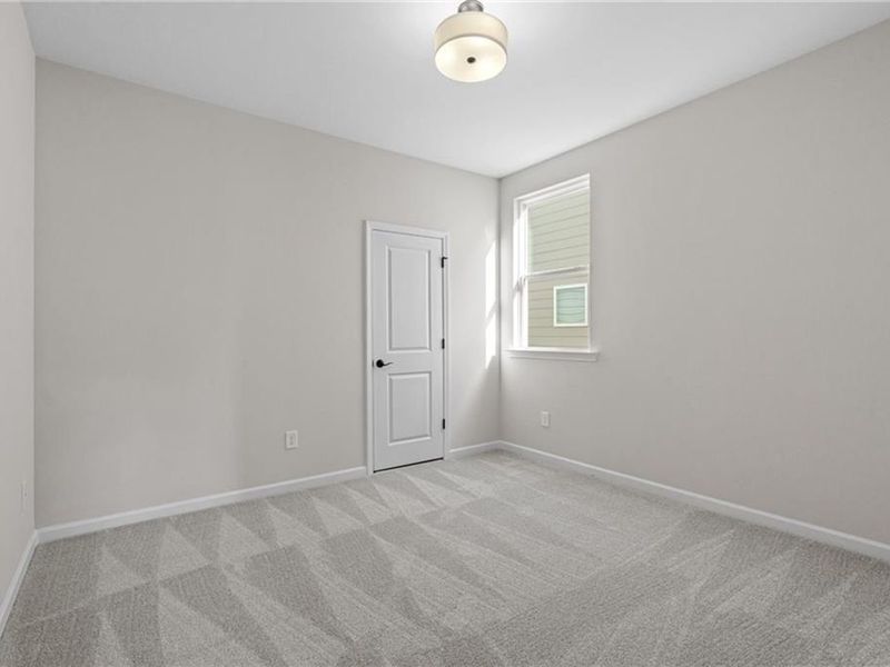 Spacious, unfurnished interior of a new home in Kelly Preserve, Loganville (Image 23). Spacious, unfurnished interior of a new home in Kelly Preserve, Loganville (Image 23).