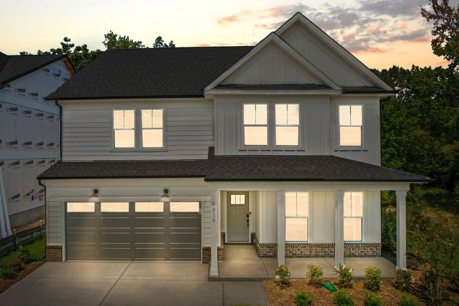 Front exterior of a new home in Elmbrook, Indian Trail, NC, highlighting curb appeal (Image 37). Front exterior of a new home in Elmbrook, Indian Trail, NC, highlighting curb appeal (Image 37).
