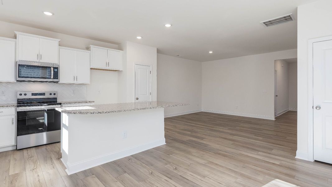 Furnished interior view inside a new home in Battle Bridge, Raleigh (Image 7).