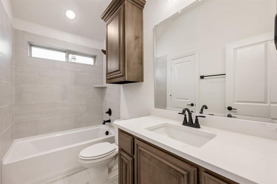 Furnished interior view inside a new home in Villages of Hurricane Creek, Anna (Image 17).