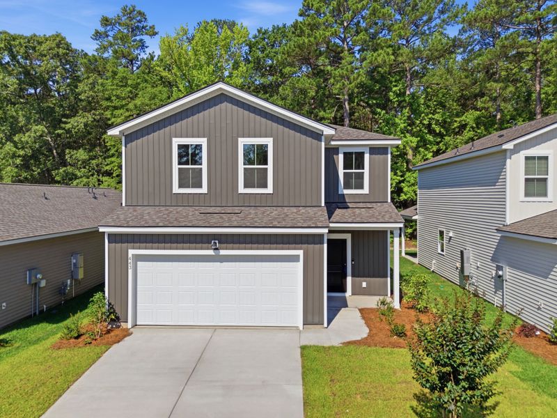 Front exterior of a new home in Grand Arbor, Blythewood, SC, highlighting curb appeal (Image 18). Front exterior of a new home in Grand Arbor, Blythewood, SC, highlighting curb appeal (Image 18).