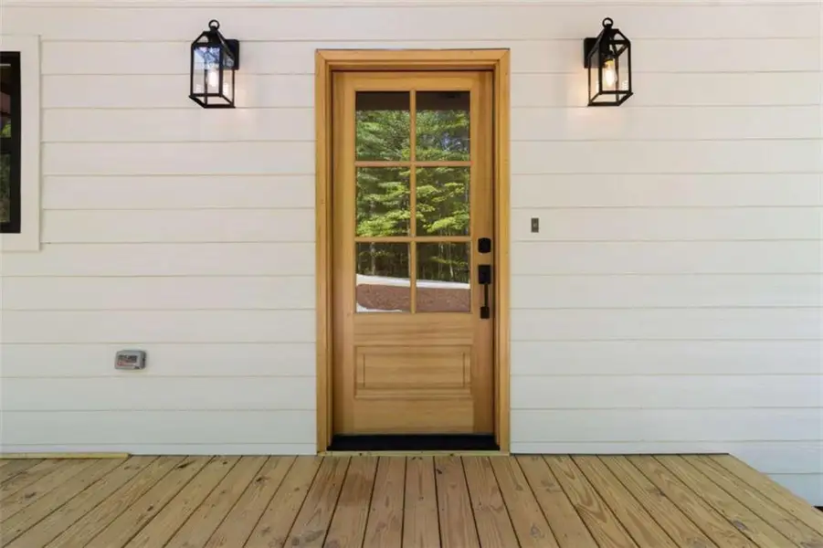 Exterior details and patio area of a home in , Ellijay (Image 31).