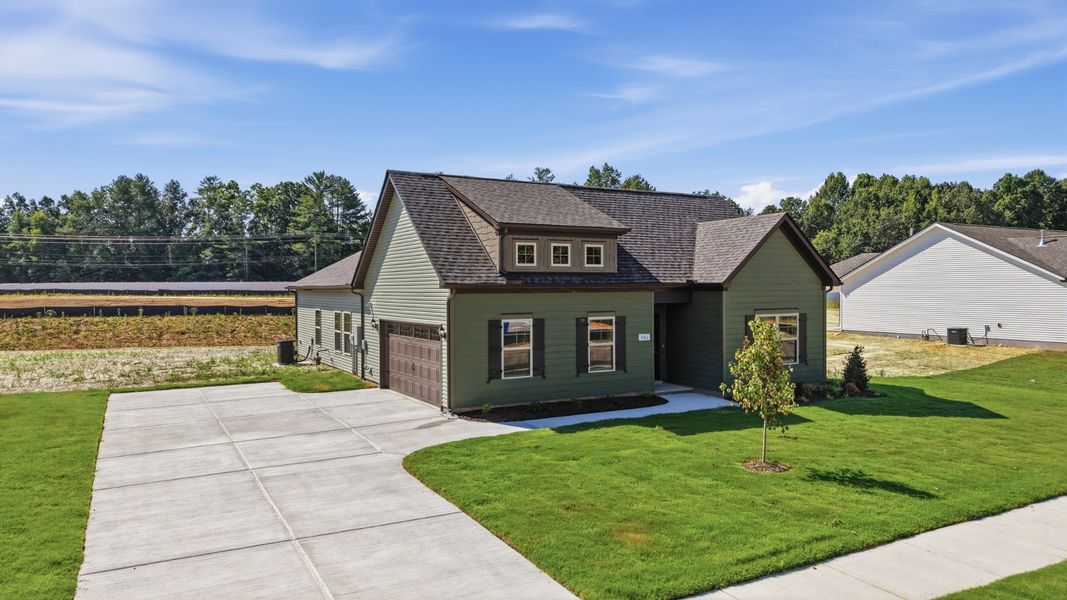 Front exterior of a new home in Stillwater, Tullahoma, TN, highlighting curb appeal (Image 17). Front exterior of a new home in Stillwater, Tullahoma, TN, highlighting curb appeal (Image 17).