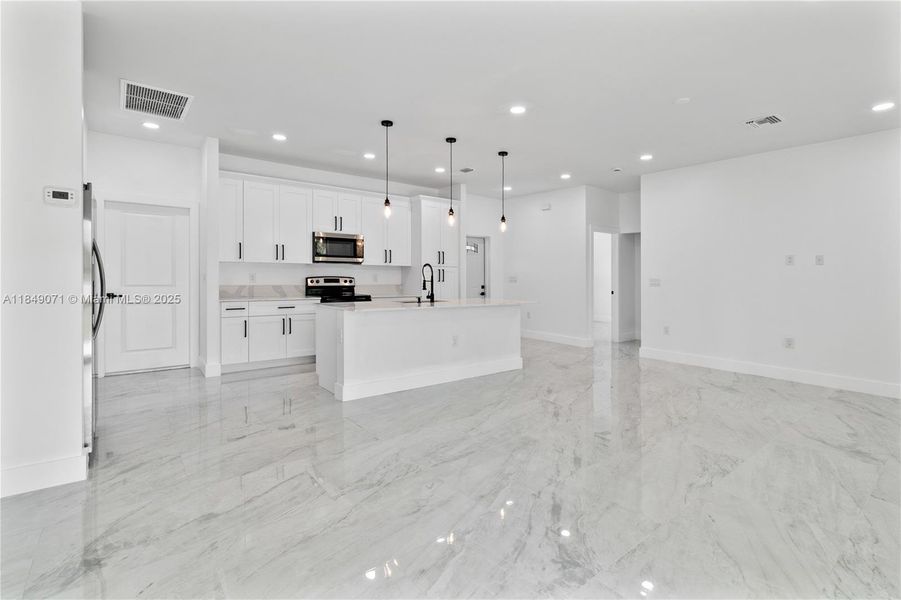 Furnished interior view inside a new home in , Lehigh Acres (Image 4). Furnished interior view inside a new home in , Lehigh Acres (Image 4).