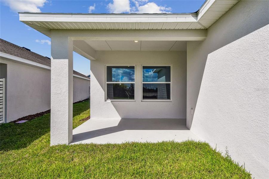 Exterior details and patio area of a home in North River Ranch – Garden Series, Parrish (Image 26). Exterior details and patio area of a home in North River Ranch – Garden Series, Parrish (Image 26).