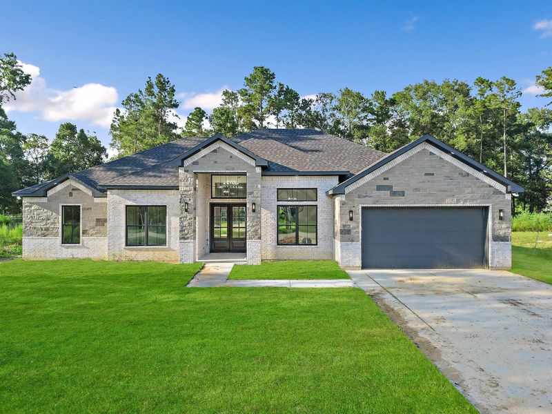 Front exterior of a new home in , Dayton, TX, highlighting curb appeal (Image 22). Front exterior of a new home in , Dayton, TX, highlighting curb appeal (Image 22).