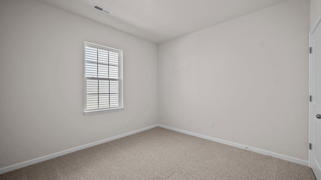Spacious, unfurnished interior of a new home in Ridgewood Farms, Winterville (Image 14).