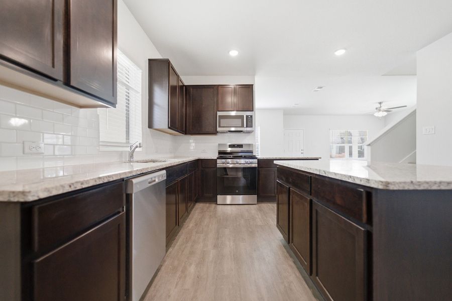 Furnished interior view inside a new home in La Terra, Celina (Image 29).