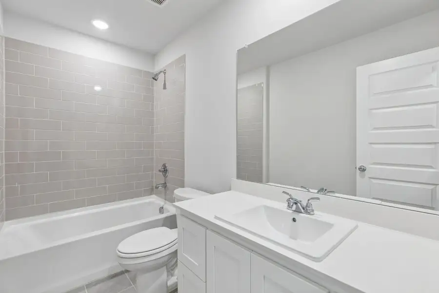 Bathroom in the Harrison home plan by Trophy Signature Homes – REPRESENTATIVE PHOTO Bathroom in the Harrison home plan by Trophy Signature Homes – REPRESENTATIVE PHOTO