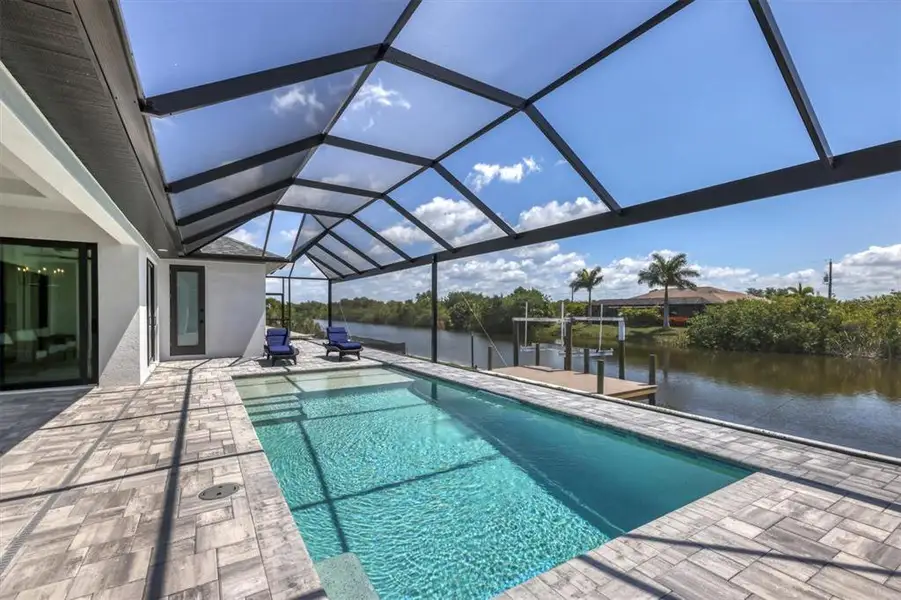 Exterior details and patio area of a home in , Port Charlotte (Image 3).