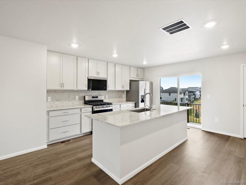 Furnished interior view inside a new home in Three Hills, Morrison (Image 11).