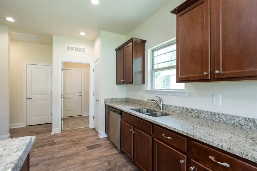 Representative furnished interior of a home built from the 1602-2 by Adams Homes in Ham Farm, La Grange (Image 7).