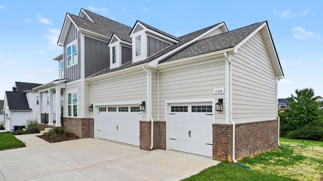 Front exterior with 3-car garage Front exterior with 3-car garage
