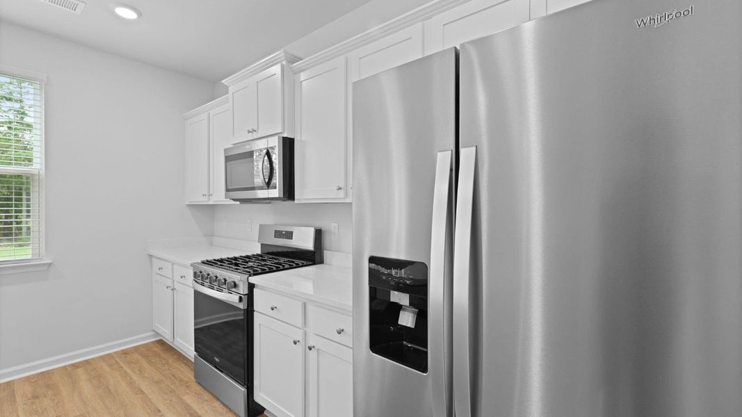 Furnished interior view inside a new home in Pineview North, Summerville (Image 8).