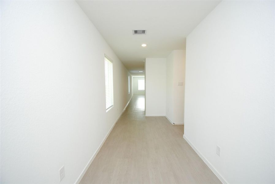 Spacious, unfurnished interior of a new home in Wharton Lakes, Wharton (Image 24).