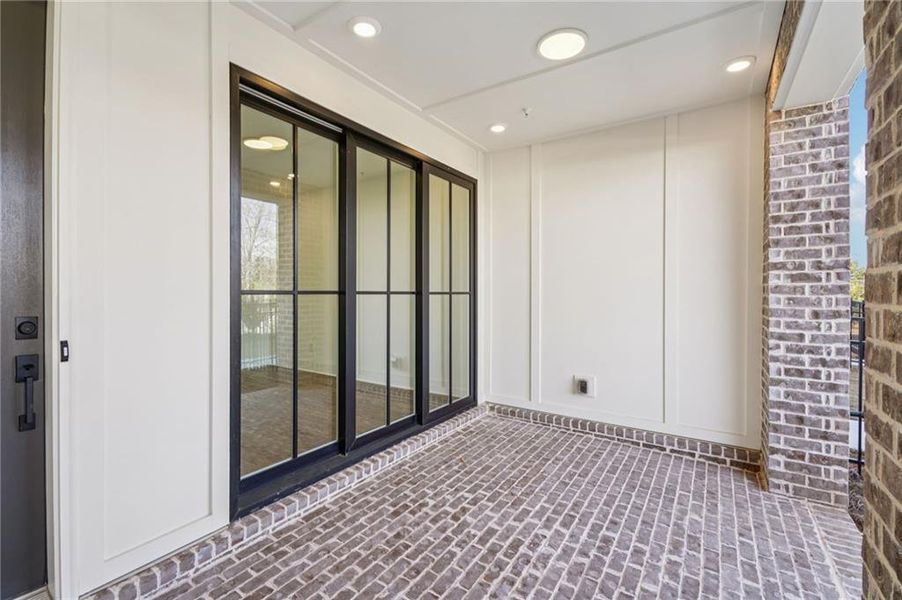 Exterior details and patio area of a home in IveyBrooke, Alpharetta (Image 25).