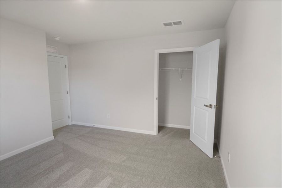 Spacious, unfurnished interior of a new home in Wren Woods 2-Story, Gray Court (Image 17).
