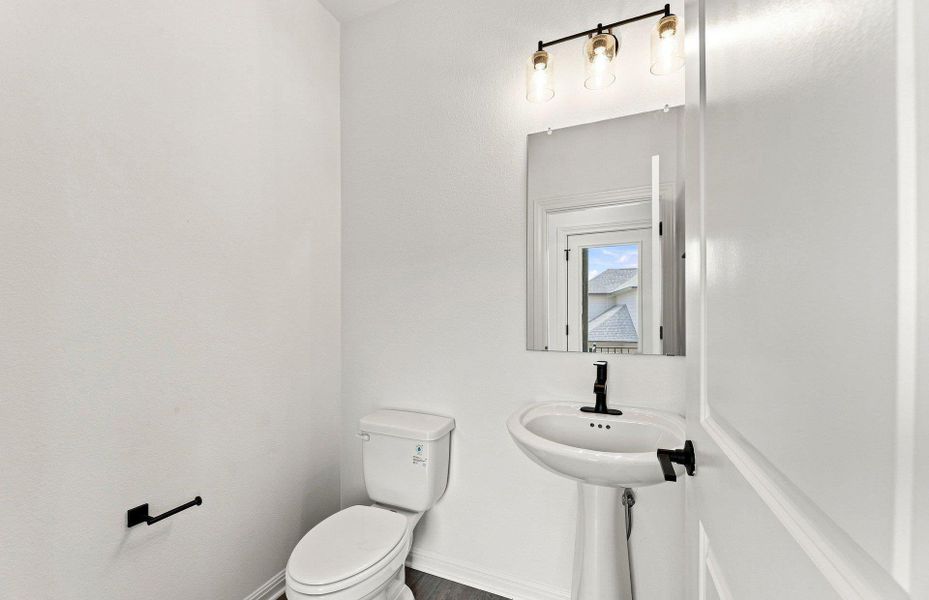 Furnished interior view inside a new home in Bluffview Reserve, Leander (Image 11).
