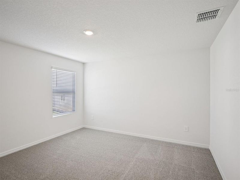 Spacious, unfurnished interior of a new home in Leyland Preserve - Premier Series, Brooksville (Image 20).