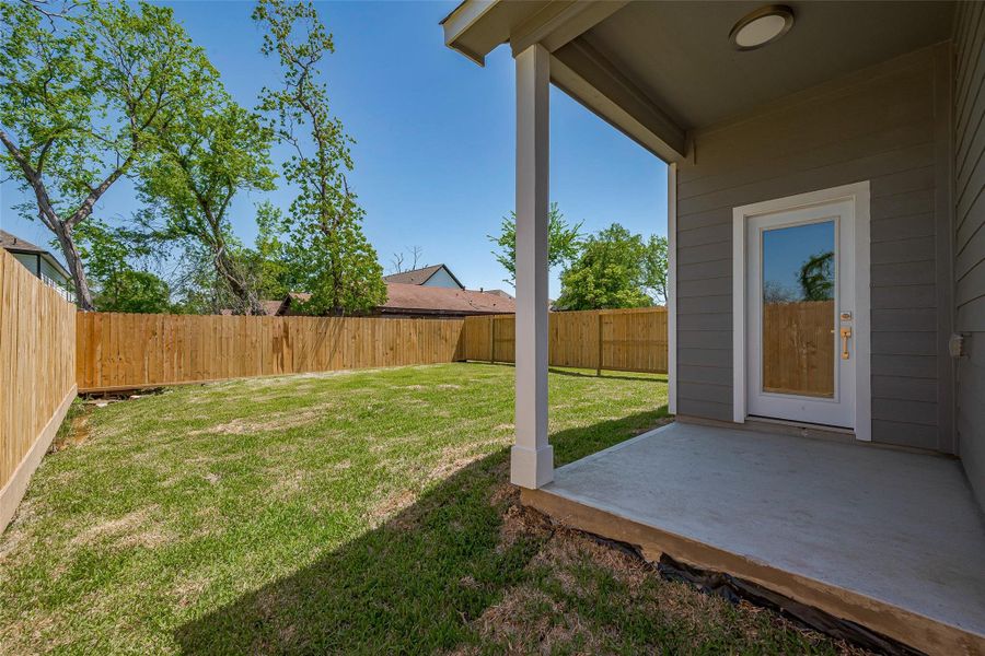 Exterior details and patio area of a home in , Houston (Image 3).
