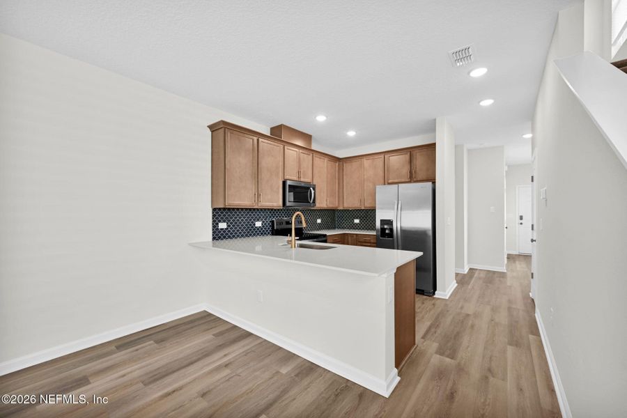 Furnished interior view inside a new home in Baxley Villas, Middleburg (Image 12).
