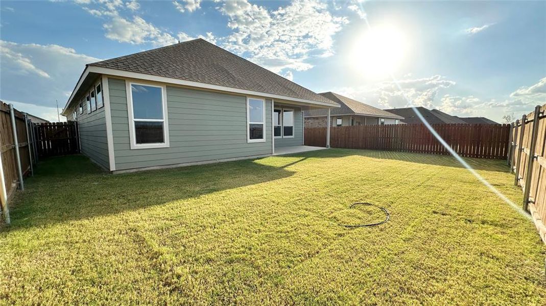 Exterior details and patio area of a home in Rock Creek Ranch, Fort Worth (Image 16).