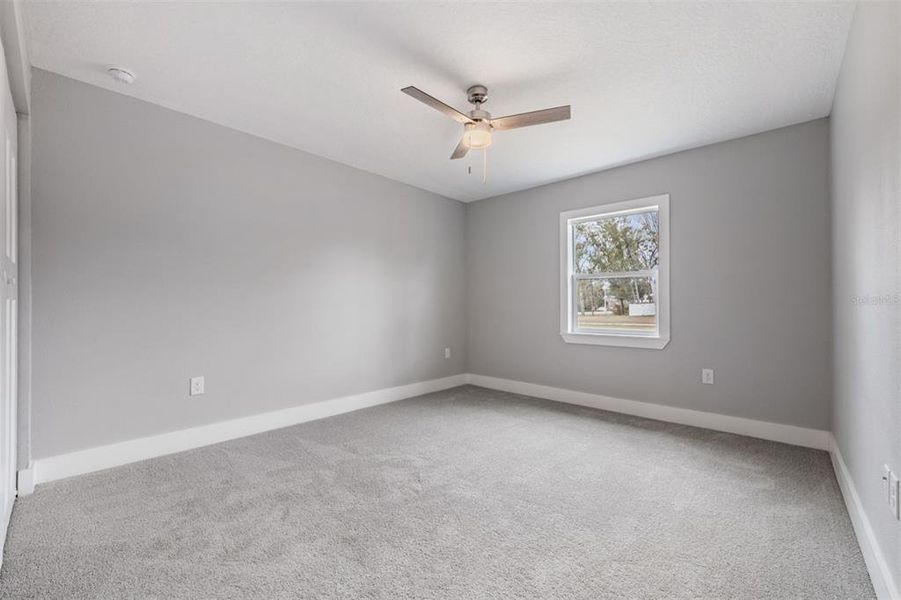 Spacious, unfurnished interior of a new home in , Dade City (Image 19).