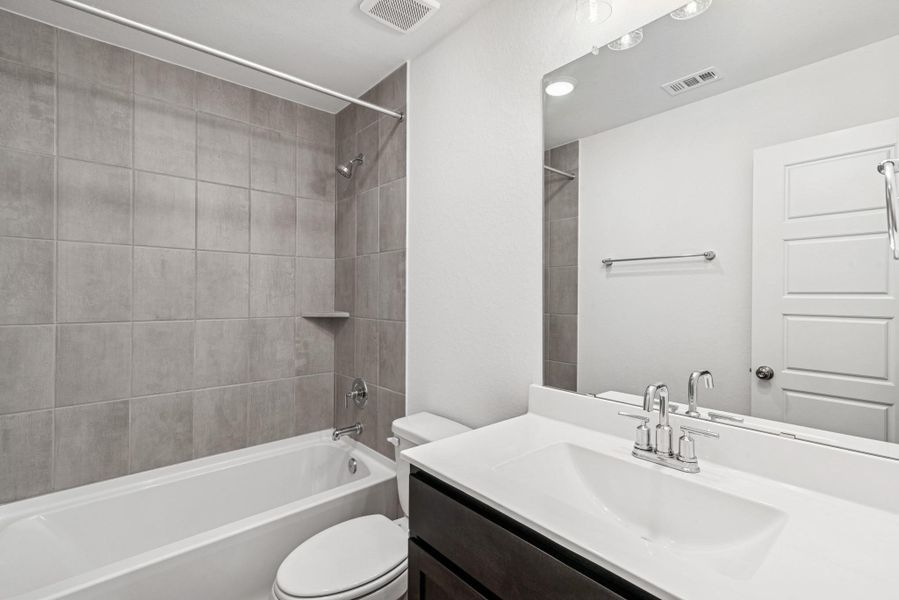 Furnished interior view inside a new home in Pinewood at Grand Texas, New Caney (Image 3).