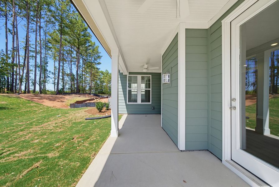 Exterior details and patio area of a home in Sweetbrier, Durham (Image 3).