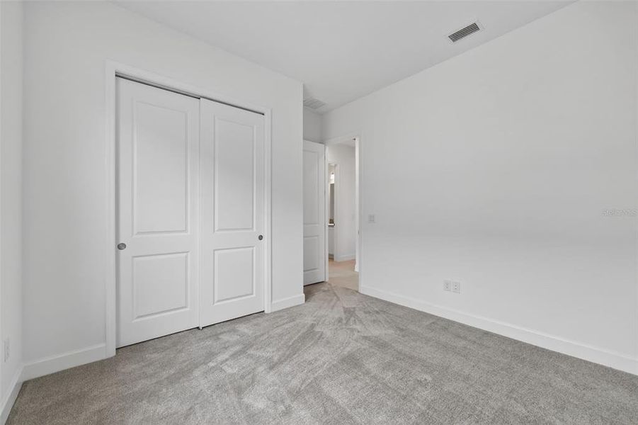 Spacious, unfurnished interior of a new home in Winding Ridge, Wesley Chapel (Image 35).